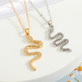 Coiled Snake Pendant Necklaces in Gold or Silver Tone view 1