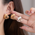 Gold and Silver Leopard Print Curved Triangle Stud Earrings view 1