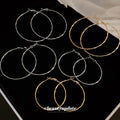 Silver Tone Textured Hoop Earrings in Three Sizes Decorative Jewelry view 3