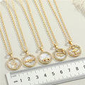Gold Tone Round Crystal Framed Motif Pendant Necklaces in Nine Designs view 3