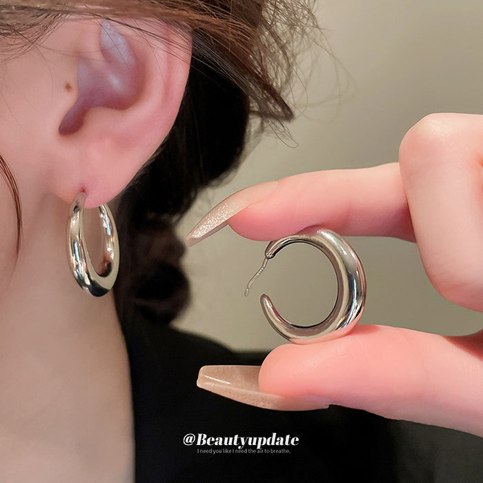 Metallic Hoop and Statement Earrings in Twenty-One One Styles