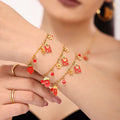 Garnet Christmas Charm Necklace and Bracelet in Gold Tone view 3