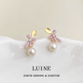 Gold Tone Spoon Top Purple Bow And White Pearl Stud Earrings view 1