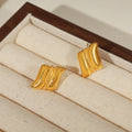 Gold Steel Twin Curve Stud Earrings Beaded Center Bar view 4