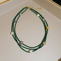 Layered Bead and Pearl Necklaces in Three Cord Colors view 7