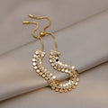 Gold Tone Three Row Disc And Crystal Slider Bracelet view 3