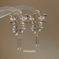 Ornate Crystal Drop Statement Earrings with Polished Metal Tone Details view 4