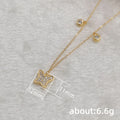 Gold Tone Star and Butterfly Station Necklace with Clear Stones view 5