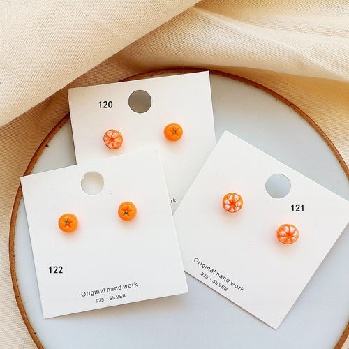 Cards 120 121 122 orange tangerine stud pairs on display plate