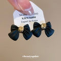 Black Bow Stud Earrings With Gold-Tone Centers - One Style view 1