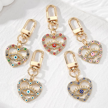 Gold Tone Rhinestone Heart Lash Eye Clip Keychains in Five Colors