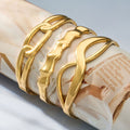 Sculptural Hinged Bangle Collection in Gold and Silver Tone view 4
