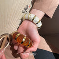 Cream Or Brown Marbled Segmented Stretch Bracelet With Gold Spacers view 3
