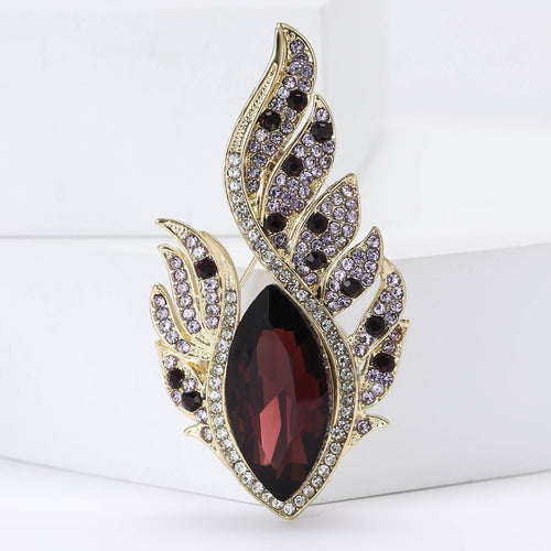 Feather Eye Crystal Brooch With Marquise Center Stone displayed at an angled product view
