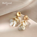 Gold Tone Matte Top And White Shell Petal Fringe Stud Earrings view 1