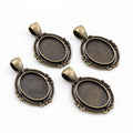 Scroll Edge Oval Pendant Cabochon Settings in Two Finishes view 3