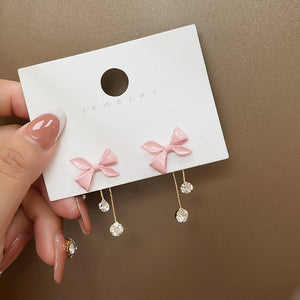 Pink Enamel Bow Drop Earrings with Gold-Tone Chain and Stones