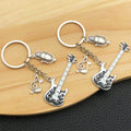 Antique Silver Guitar Microphone and Music Keychain Pair view 1