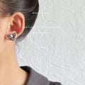 Silver Tone Hammered Sculpted Heart Stud Earrings For Women view 2