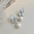 Silver Tone Clear Butterfly And White Pearl Drop Stud Earrings view 1