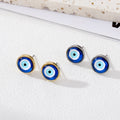 Gold and Silver Tone Round Blue Evil Eye Stud Earrings view 1