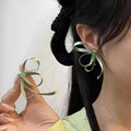 Ribbon Bow Stud Earrings in Four Pastel Colors for Everyday Styling view 9