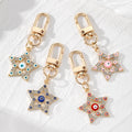 Gold Tone Rhinestone Star Evil Eye Clip Keychains in Four Colors view 1