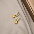 Gold Double Bar Clear Look Pearl Look Huggie Earrings view 3