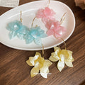 Gold Tone Hoop Earrings With Translucent Yellow Flower Drops view 2