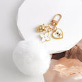 Fluffy Pom Pom Keychain With Heart Bear Charm And Flower Pendant view 10