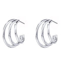 Gold Tone Triple Wire Hoop Earrings With Layered Open Design view 2