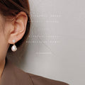 Gold Tone Clear Stone Snowflake And Irregular White Pearl Earrings view 2