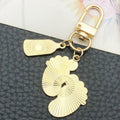 Eight Pink and Blue Baby Bottle Footprint Keychain Designs view 4