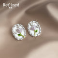 Clear Oval Dome White Tulip And Green Stem Stud Earrings view 3