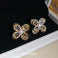 Gold Tone Crystal Petal Flower Stud Earrings With Pearl Centers view 3