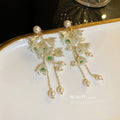 White Floral Pearl and Crystal Chain Drop Earrings view 3
