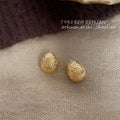 Gold Textured Egg Stud Earrings Matte Pebble Surface view 3