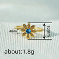 Gold Tone Flower Ring With Blue Center and Green Petals view 4