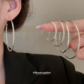 Slim Silver Round Hoop Earrings in Four Sizes with Polished Metal Details view 1
