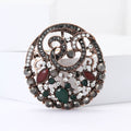 Antique Tone Round Filigree Brooch With Red And Green Stones view 2