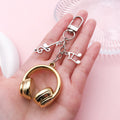 Guitar, Piano and Music Note Charm Keychains Featuring Pink Headphone Across 25 Variations view 2