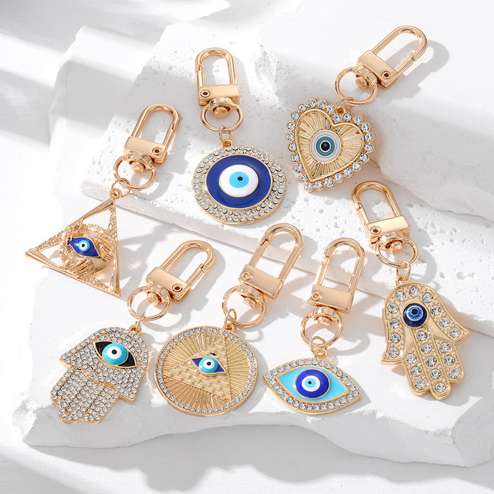 Gold and Silver Tone Crystal Hamsa Evil Eye Clip Keychains