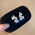 Silver Crystal Ribbon Bow Stud Earrings with Sculpted Loops view 6