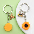Bee and Honeycomb Charm Keychains Featuring Butterfly Across 25 Pictured Variations view 2