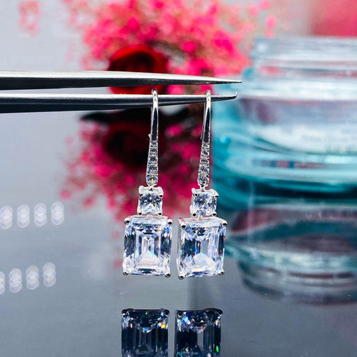 Front view showing square clear drops suspended from slim leverback hooks