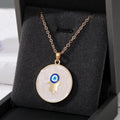 Gold and Silver Tone Round Hamsa Elephant and Star Eye Necklaces view 2