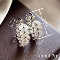 Silver Tone Marquise Leaf CZ Huggie Hoop Earrings Pair view 4