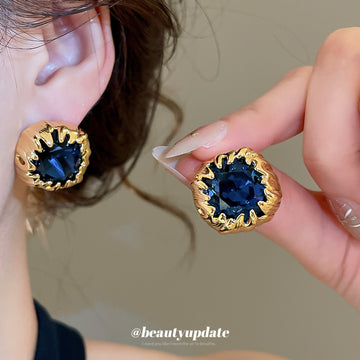 Deep Blue Faceted Stone Stud Earrings in Textured Gold Tone