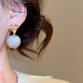 Gold Tone Heart Stud Earrings with Gray Pearl Drops view 4