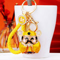 Colorful Wealth Deity Character Keychain with Gold Tone Hardware view 4